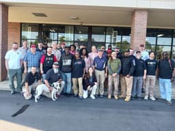 Volunteer instructors gathered outside Recoil Firearms