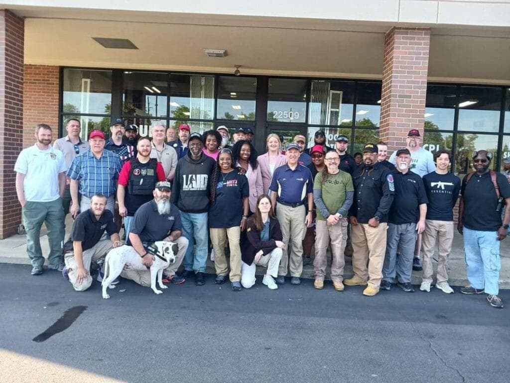 Volunteer instructors gathered outside Recoil Firearms